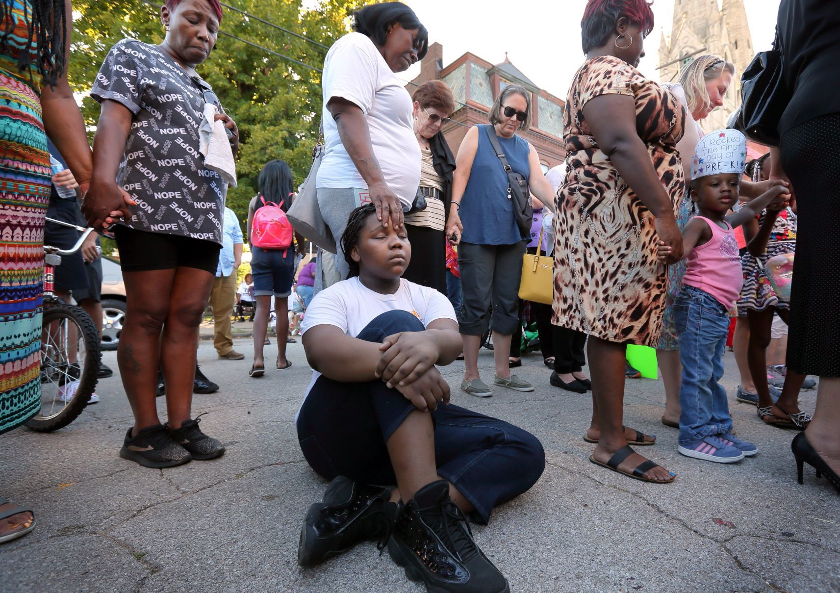 Vigil for 7-year-old Xavier Usanga killed by stray bullet in St. Louis